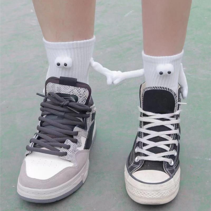 Thumbnail: Magnetic Suction Couple Holding Hands Socks with 3D Doll Eyes Mid Tube Cute Soc
