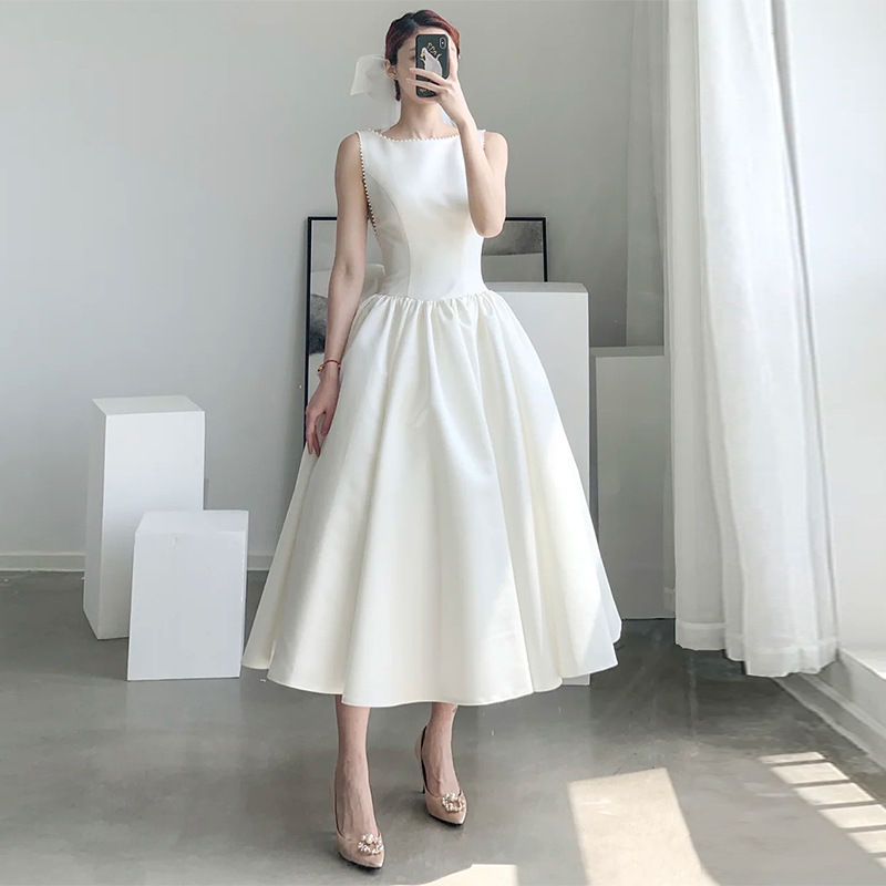 Thumbnail: Graduation Travel Photo Minimalist Small Man Dress
