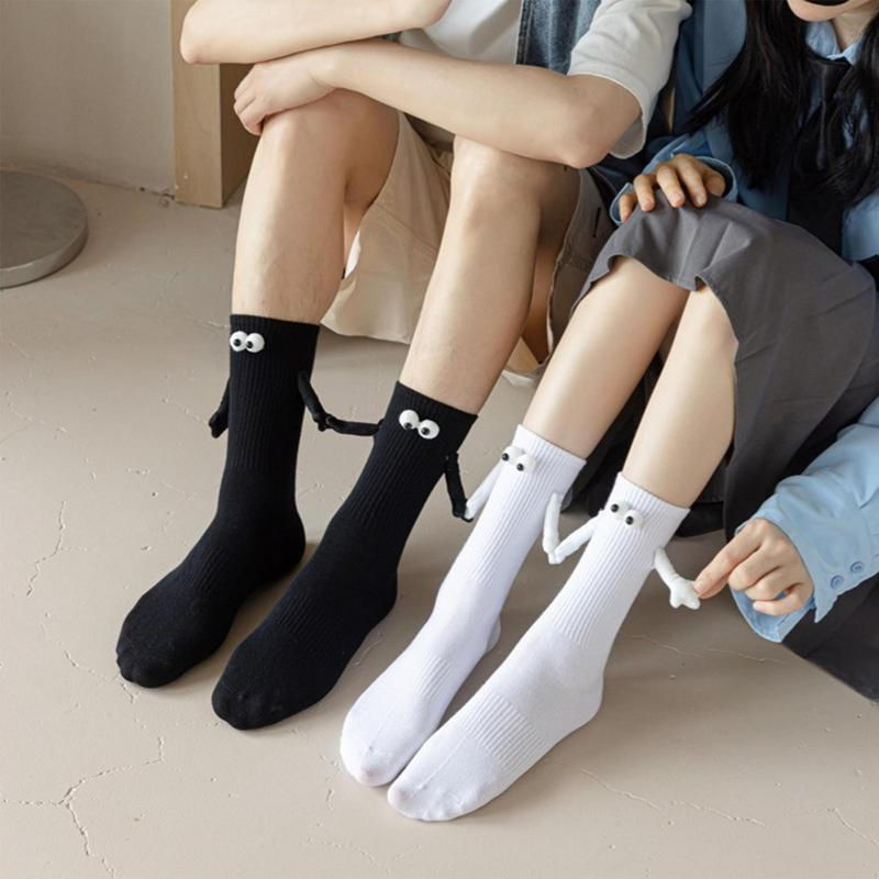 Thumbnail: Magnetic Suction Couple Holding Hands Socks with 3D Doll Eyes Mid Tube Cute Soc