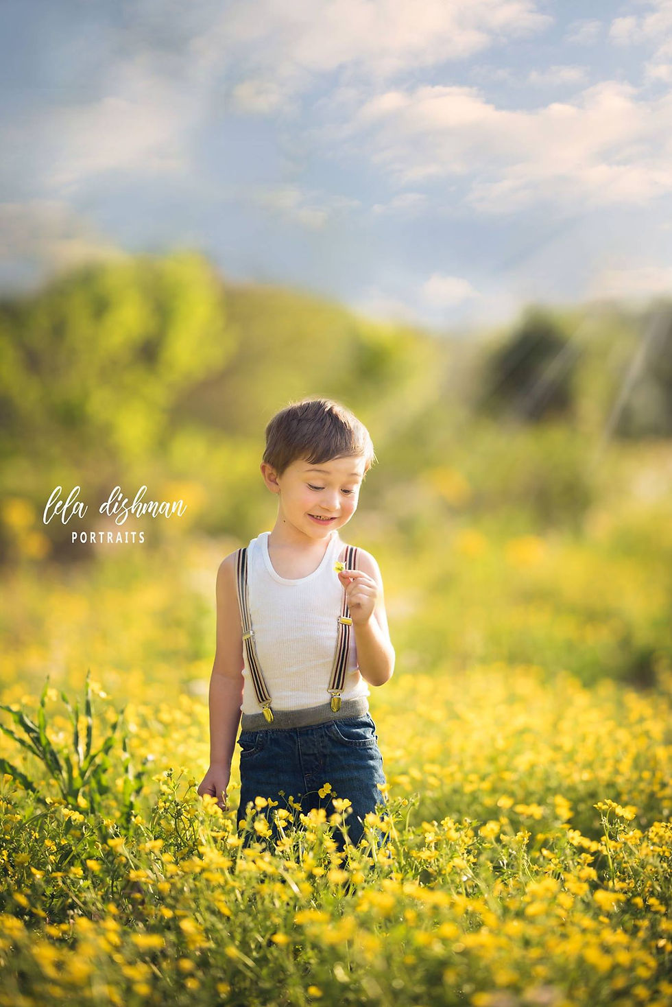 little boy wild flowers