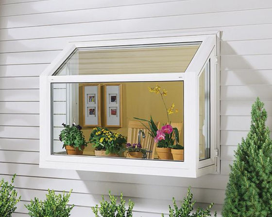Garden window extending outward from a kitchen wall, providing natural light and space for indoor plants