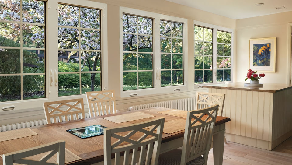 Luxury casement window open outward, providing expansive views, natural light, and refined ventilation

