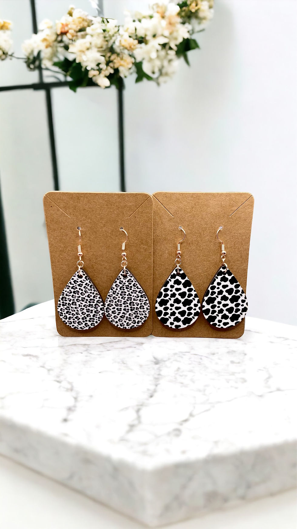 Thumbnail: Cow leopard earrings