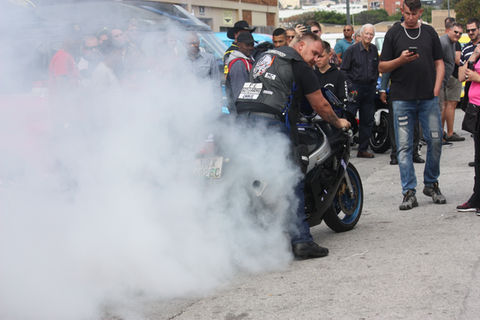 Burn out of tyre by motorcycle driver