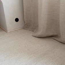Handwoven rug by Van Ghent made from fine natural materials
