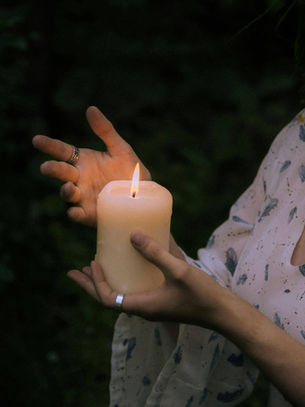 Person Holding a Candle