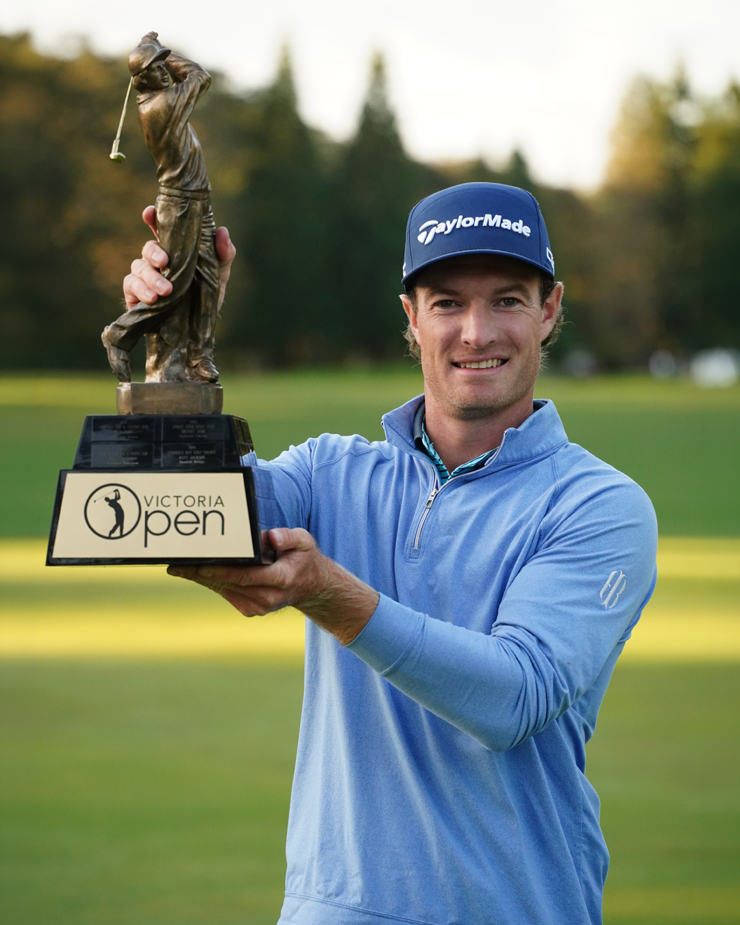 2025 champion Drew Nesbitt holding the Victoria Open trophy