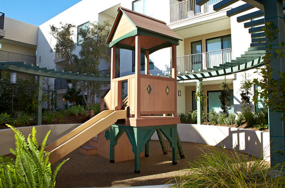 Wood play fort with slide