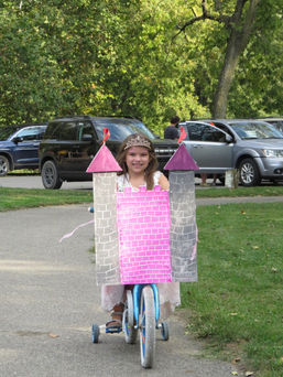 A queen and her castle bike parade