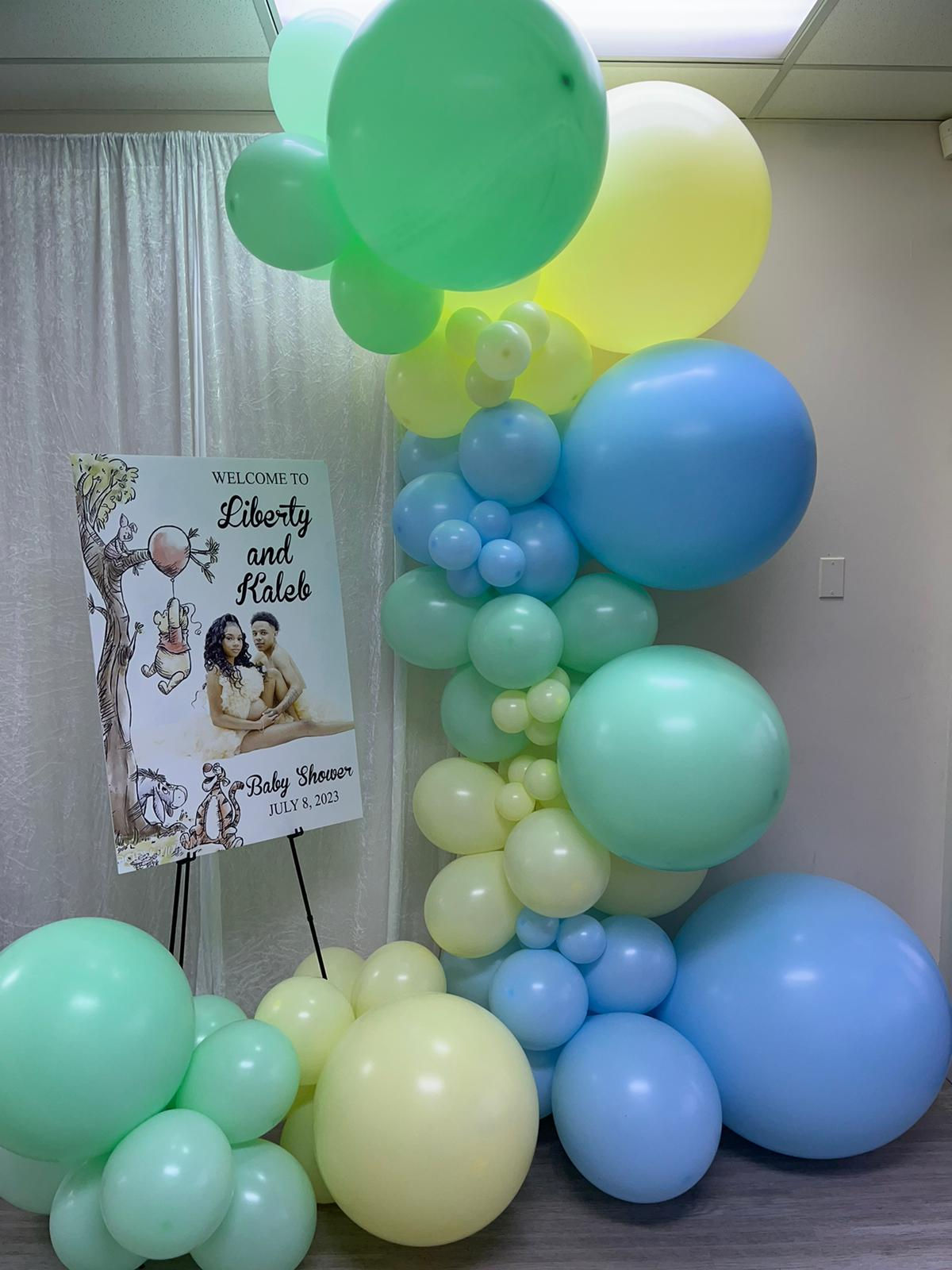 Balloon garland +custom sign