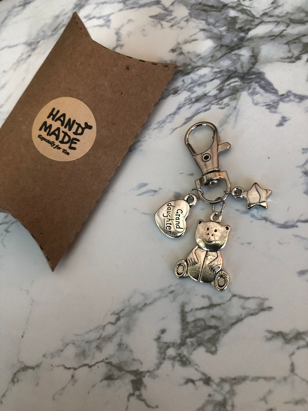 Special Granddaughter keepsake silver heart charm with teddy bear on keychain