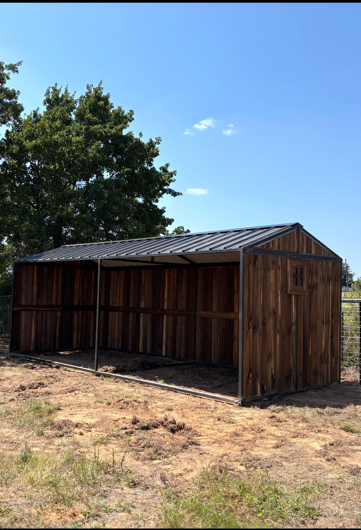 10x24 portable shed with black roof 