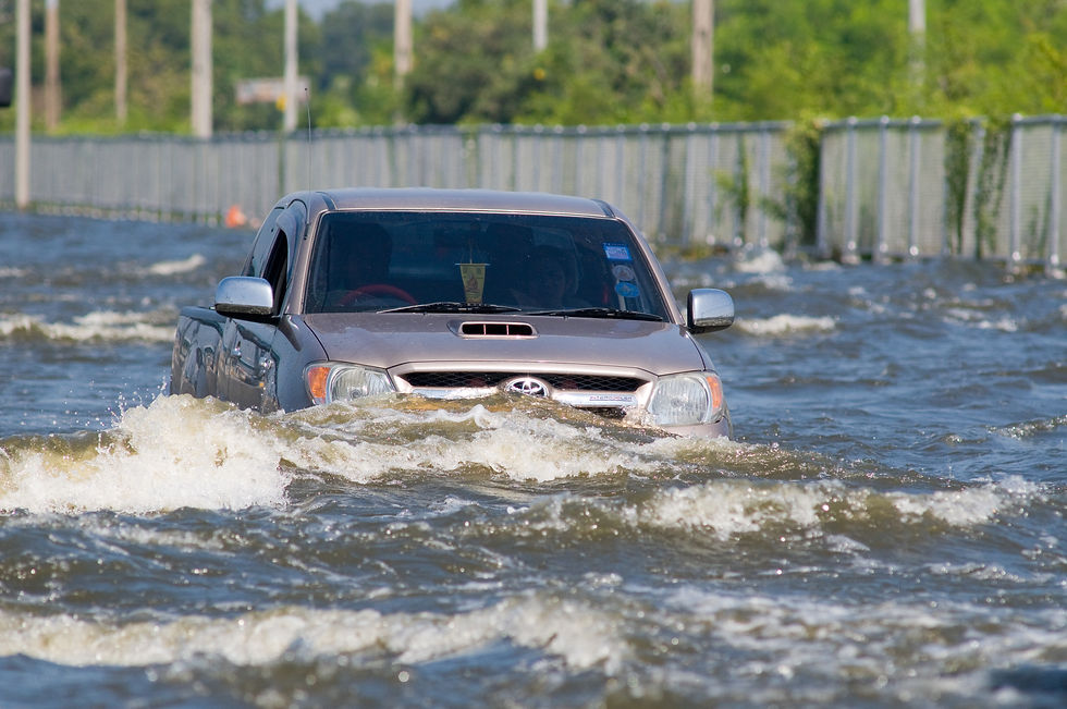 A Toyota truck stuck in a flood.