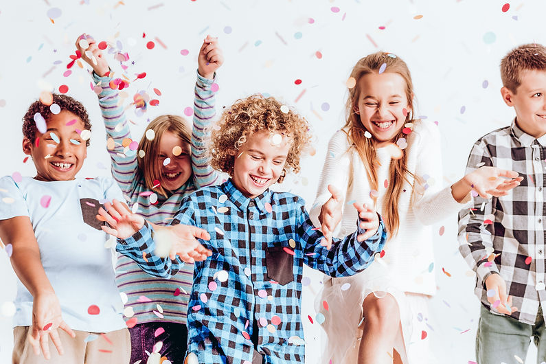 kids-with-confetti-P6X6ZVA.jpg