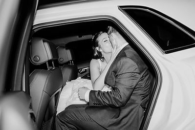bride and groom in getaway car at eagle idaho venue