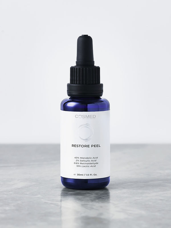 Bottle of CosMed Restore Peel solution for damaged skin barriers