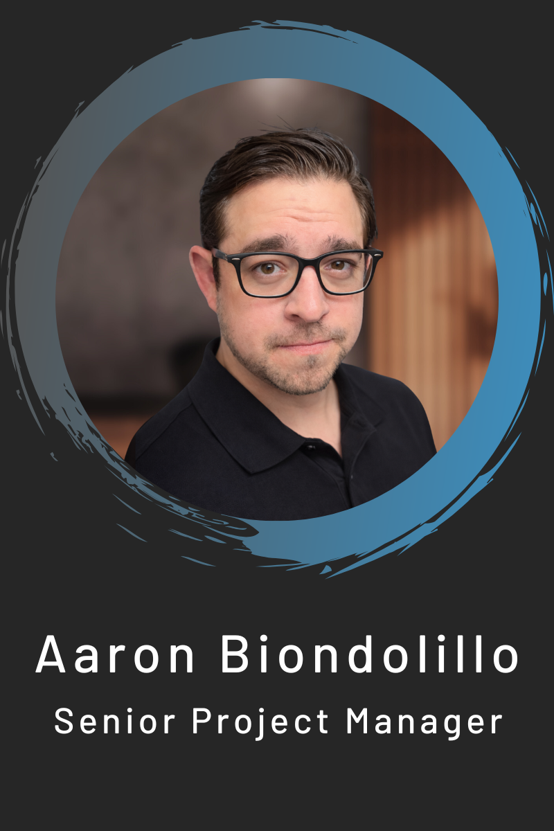 Headshot of male wearing a black polo and black rimmed glasses with blue circle around it and black background with white text reads Aaron Biondolillo Senior Project Manger
