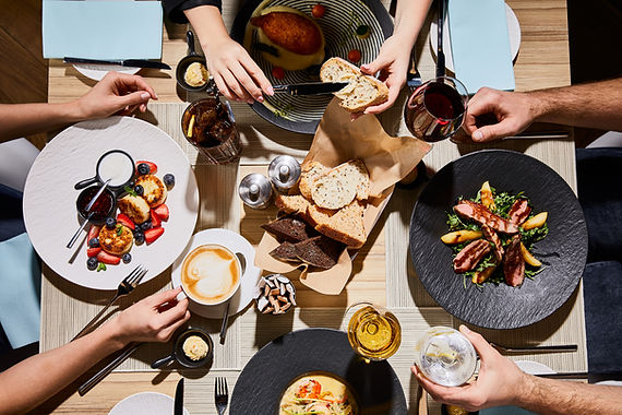 top-view-of-people-eating-delicious-food-during-di-2026-03-13-01-25-05-utc.jpg