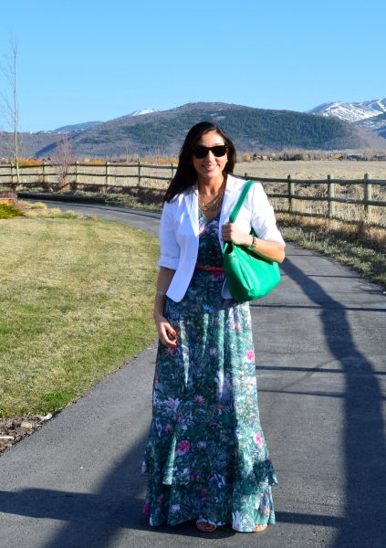 Andrea accessorizes her maxi dress with a blazer, purse and shades