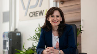 Laurence Lewis sat at our desk