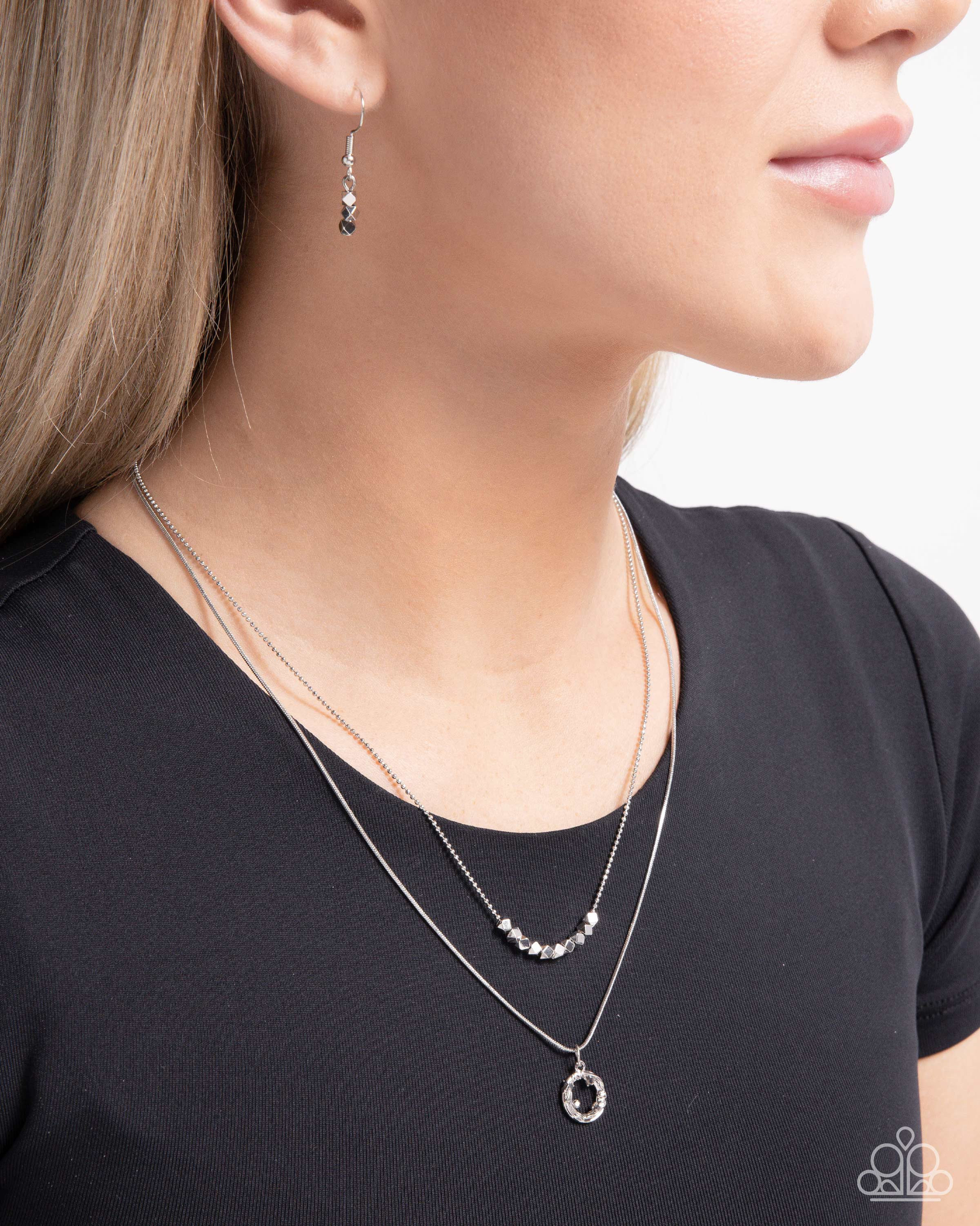 Defaced Darling - Silver - Paparazzi