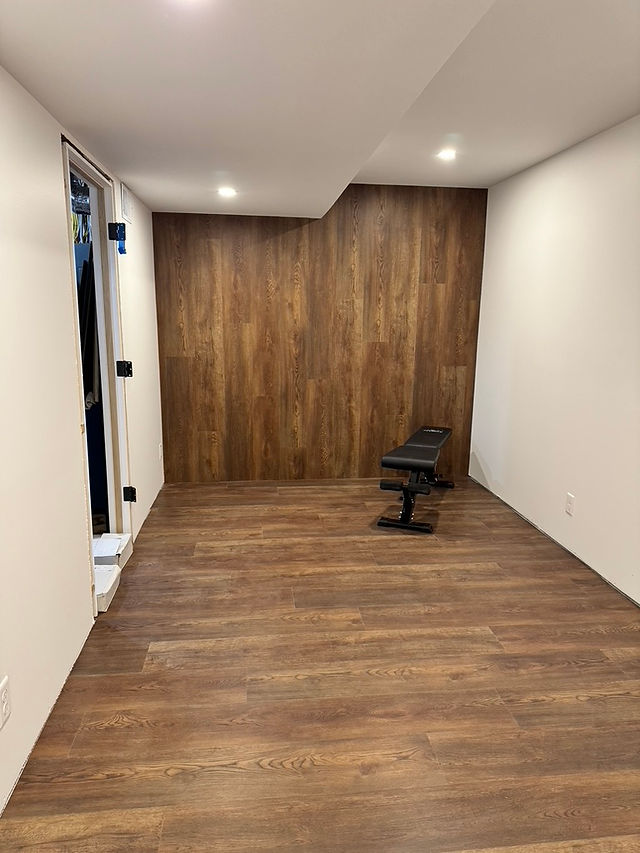 We had extra flooring - ran some up the wall for a feature wall in the gym space.