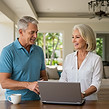 senior couple happy they know how to navigate their online world