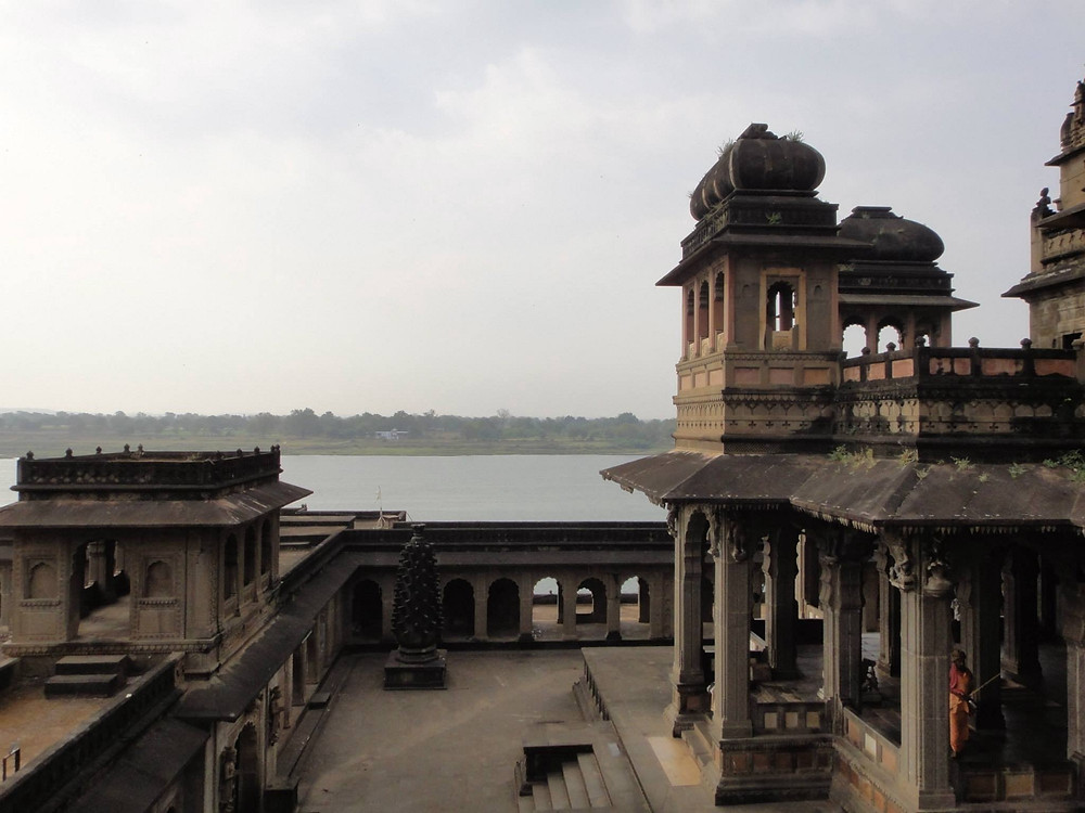 The ancient structures seem to be slightly weathered and aged by time: the domes are covered by a sediment of soot and fresh weeds poked their heads out of the cracks between bricks and stones.