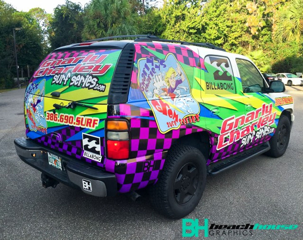 surfer graphics on a Chevy Tahoe by Beach House Graphics