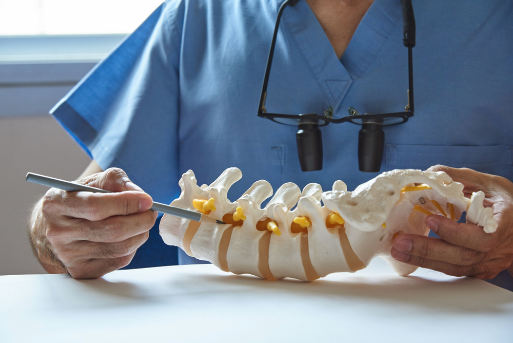 A doctor discusses spine surgery