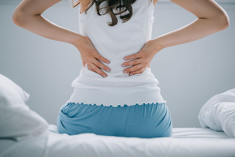 back-view-of-young-woman-in-pajamas-suffering- Small from-2024-11-17-04-34-43-small.jpg