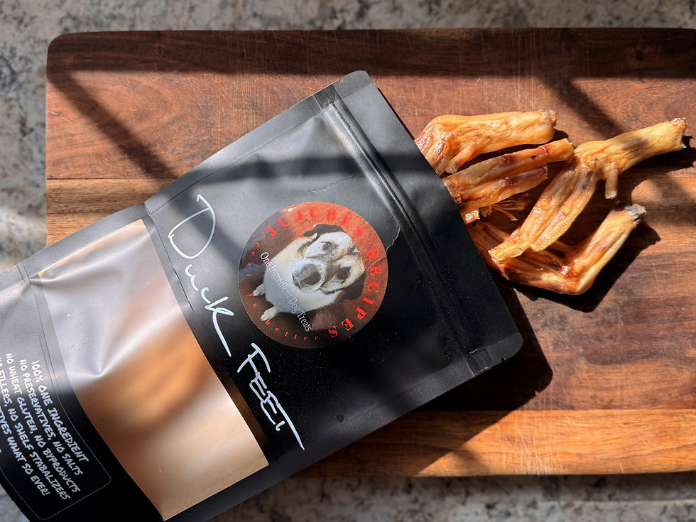 Thumbnail: Jujube's One Ingredient All Natural Duck Feet Dog Treats open bag with duck feet coming out