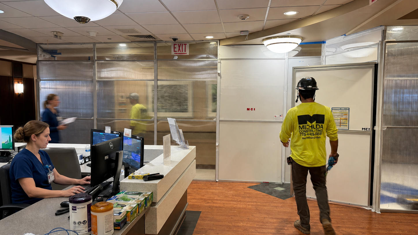 Michuda maintaining an active ICRA containment barrier within an operating hospital, separating construction activity from patient-care areas while supporting infection-control, airflow, access, and life-safety requirements.