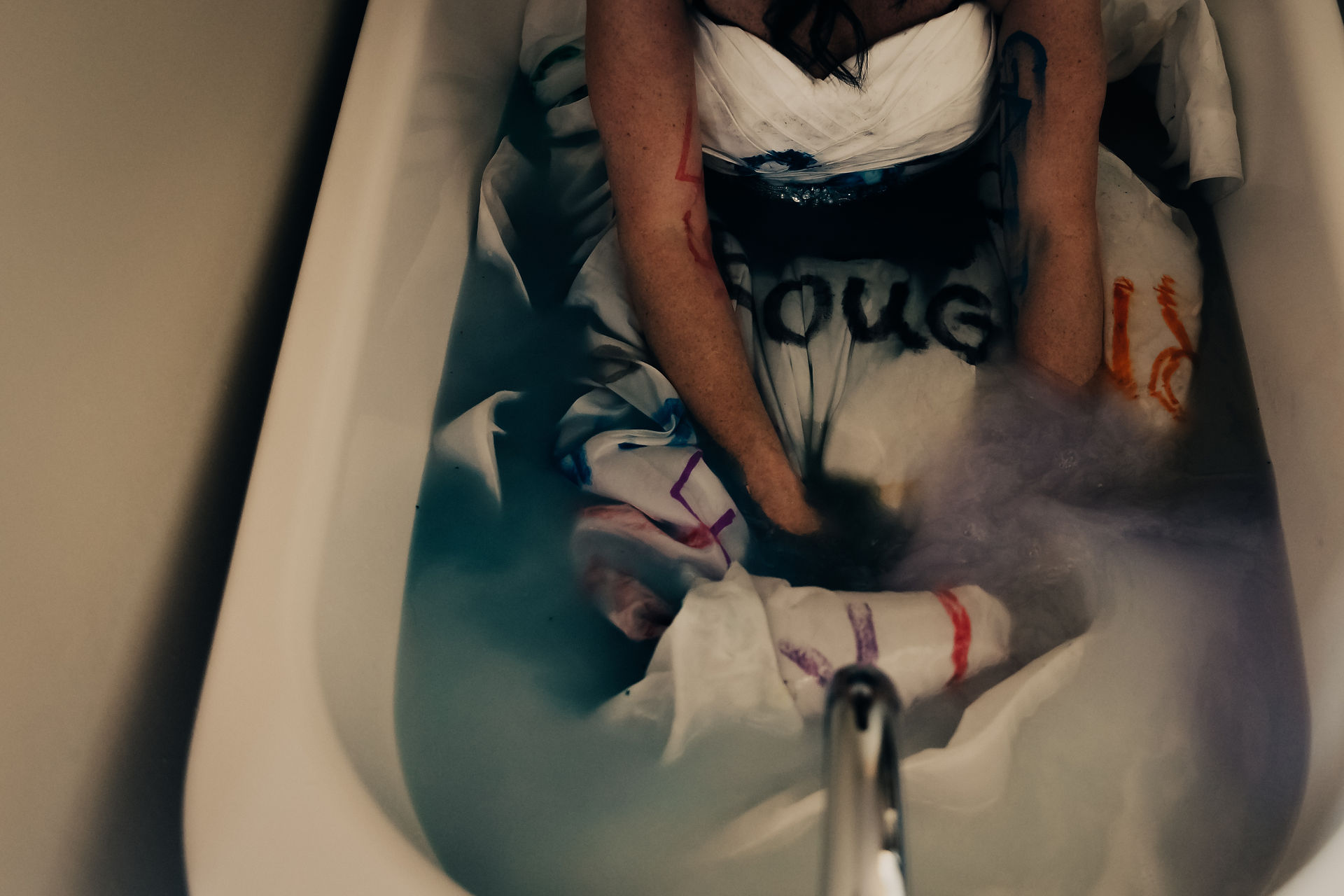 washing a dress in the bath