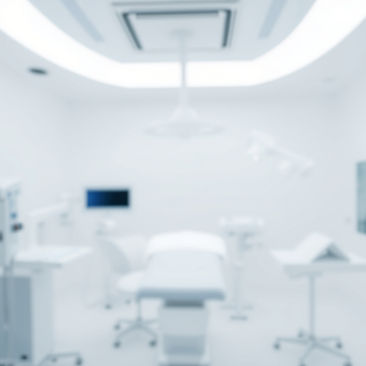 A clean, professional medical background image for a facial surgery clinic website. Minima