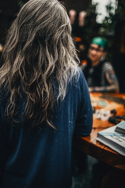 Back view of Patty Candelario, tarot and astrology reader in Colorado.