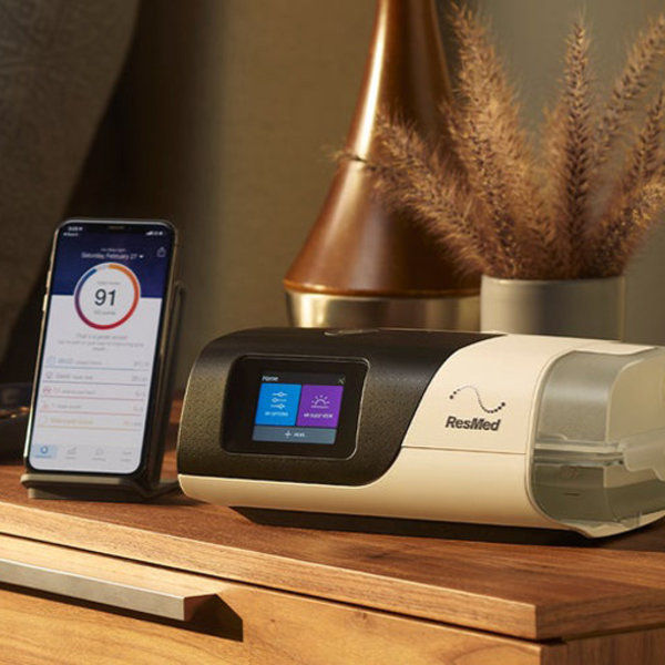 Thumbnail: AirSense 11 automatic CPAP machine with tubing and mask setup