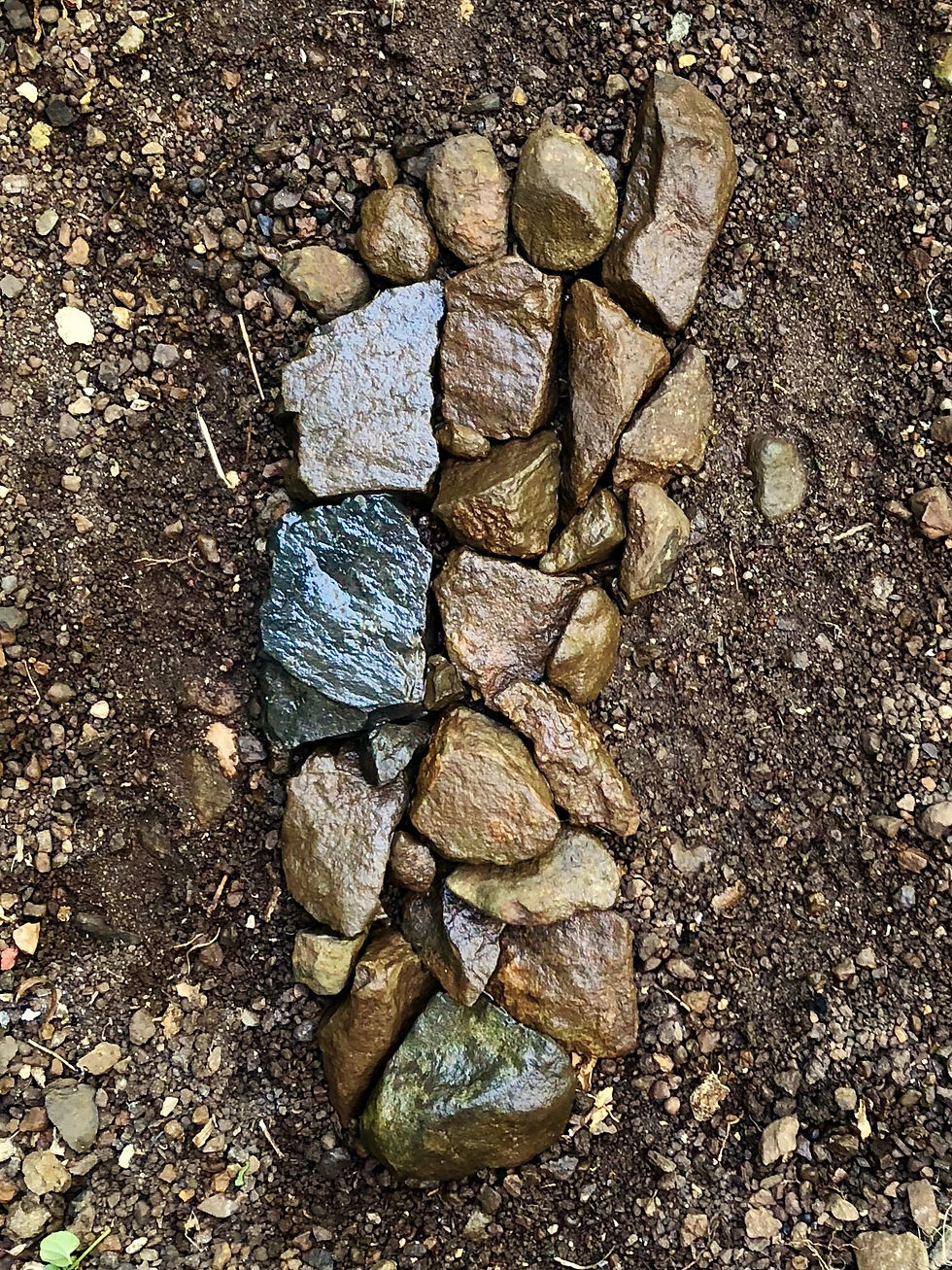 Thumbnail: Image of sculpture of foot made of stones