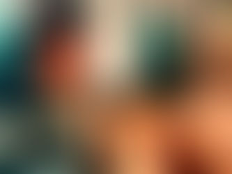 Queer, trans, Filipino writer, Adrian Kaleb Quijano, looks in the mirror