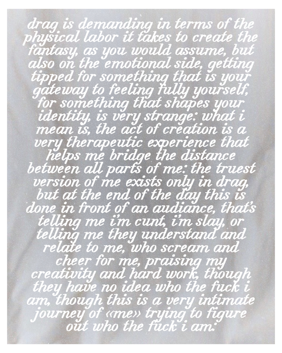 A text-only image on a pale grey fabric background, featuring a personal essay excerpt in white cursive type reflecting on the emotional and therapeutic nature of drag performance and identity.