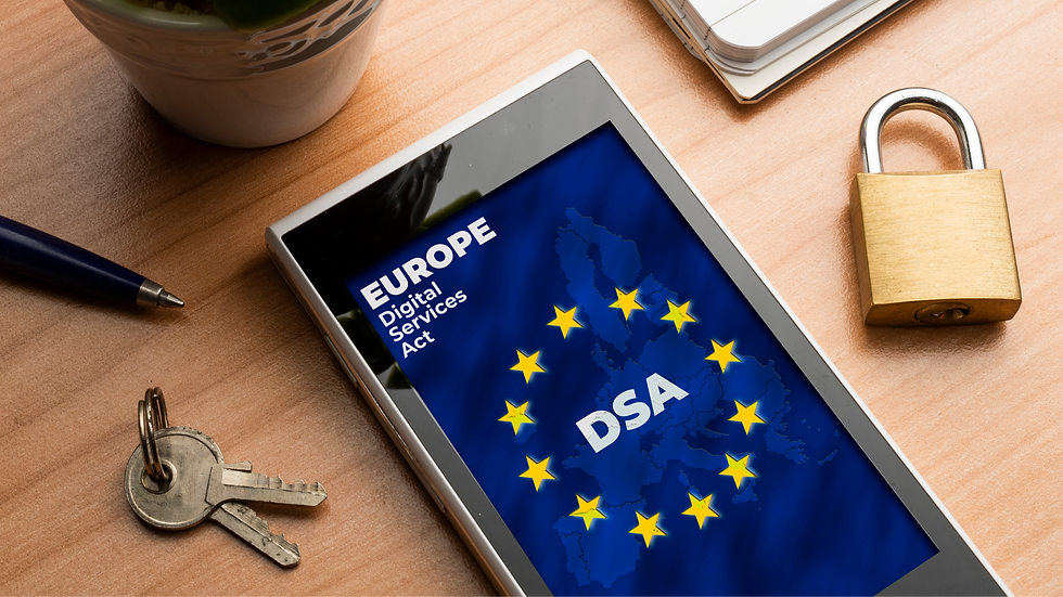 Smartphone screen displays "Europe Digital Services Act" with stars on blue EU map. Nearby are keys, a lock, pen, and notebook on a desk.