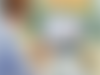 A man at his laptop looking at customer analytics