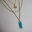 Thumbnail: Gemstone Carved Fish Necklace - Gold