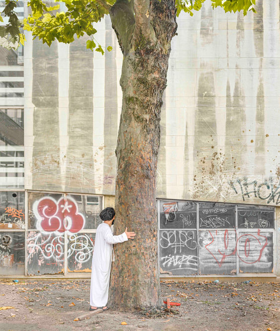 Tree hugger, Brussels, Belgium.