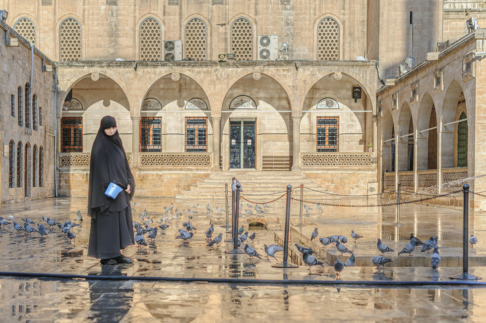 People at work, Pigeon feeder, Şanlıurfa, Turkey.