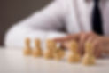 businessman-tumbling-pawn.jpg