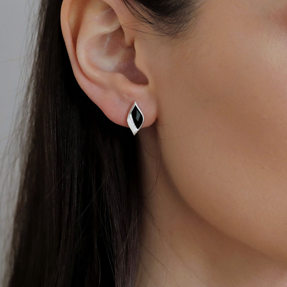 Thumbnail: Silver stud earrings set with black onyx worn by model
