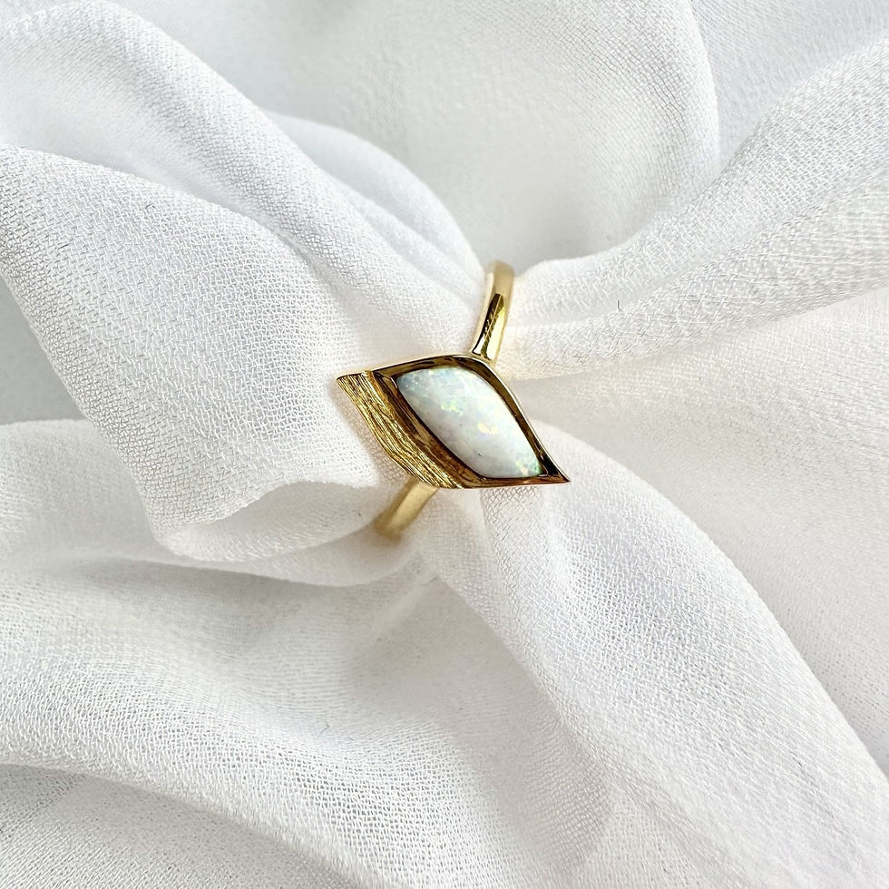 Thumbnail: Gold ring with opal stone cut in the unique Lustre & Love shape