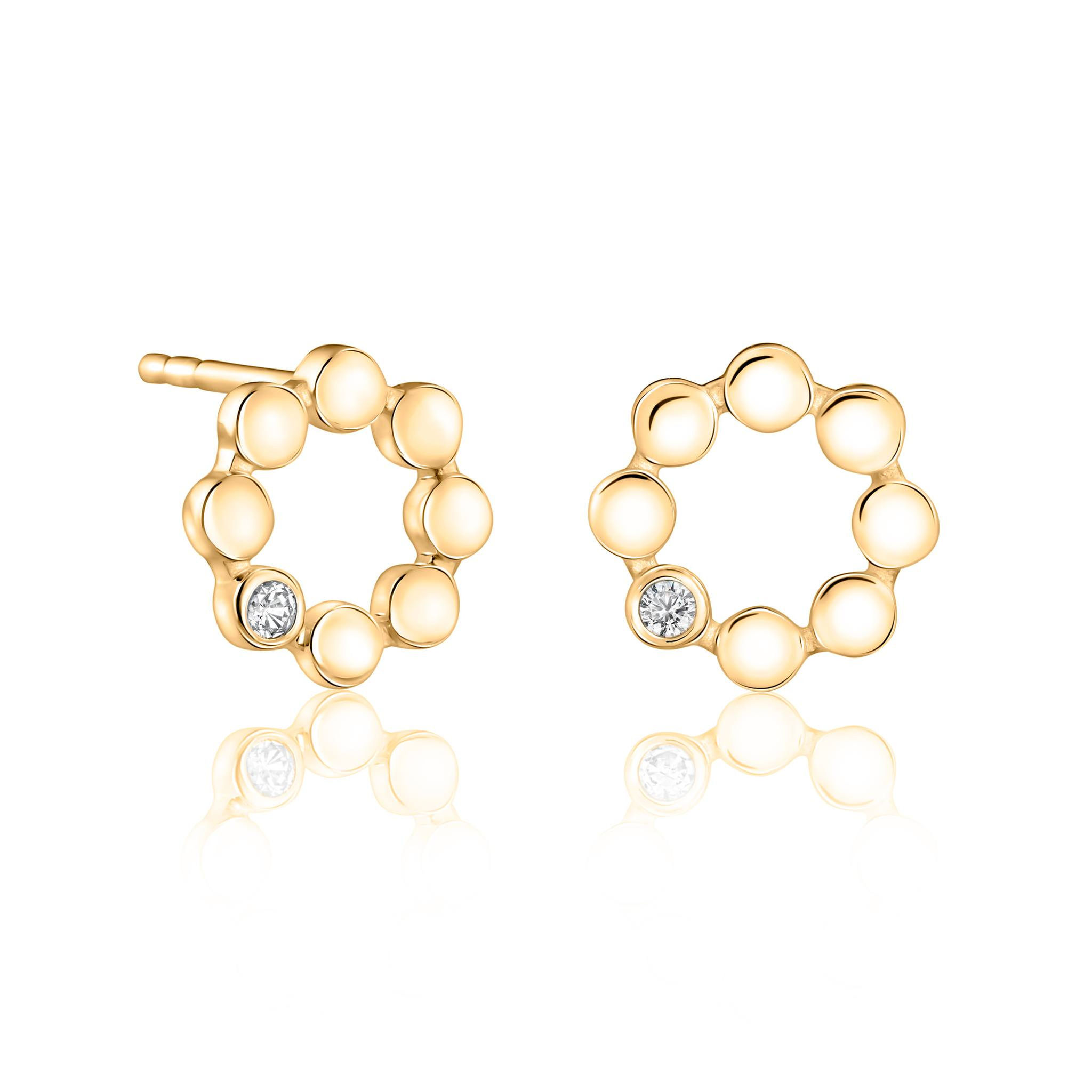 Gold vermeil stud earrings designed in a circular shape of gold discs featuring a clear cubic zirconia