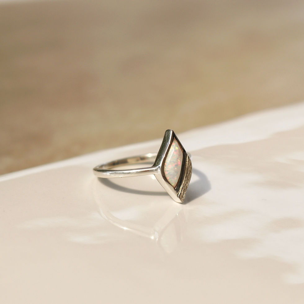 Thumbnail: Sterling silver high shine and brushed finish ring set with opal, engraved on side with 'clarity'